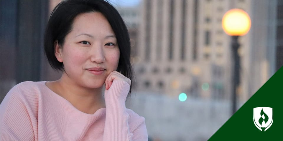 woman looking at camera with city background