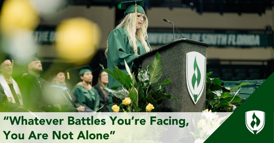 Ackerman stands at a Rasmussen podium