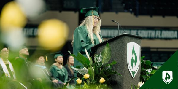 Ackerman stands at a Rasmussen podium