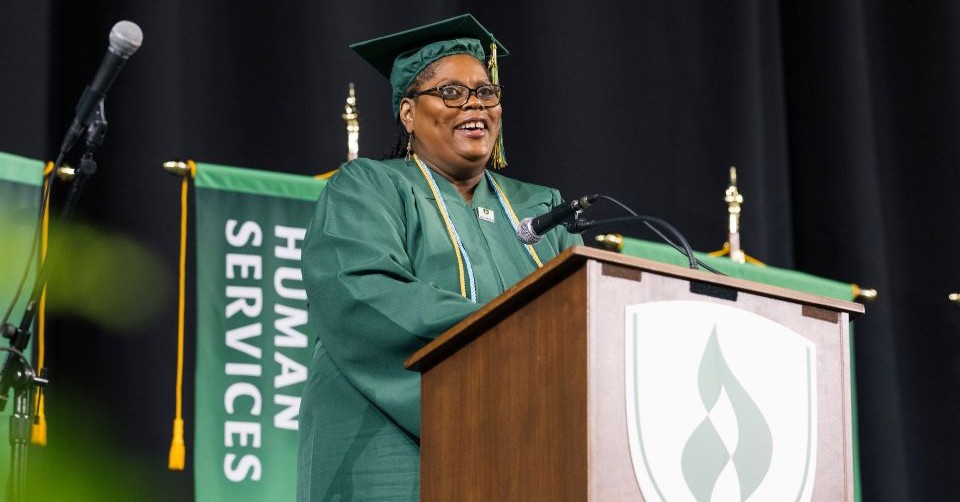 Rasmussen University graduate speaking at commencement ceremony