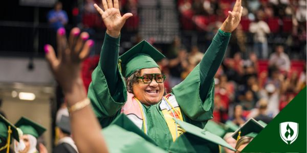 Rasmussen University graduate celebrating at commencement ceremony