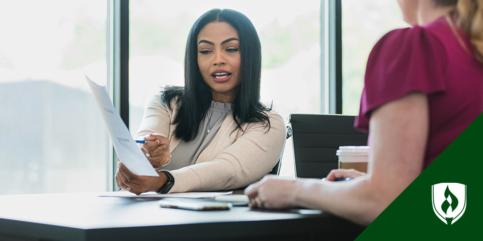 photo of a financial advisor working a desk representing becoming a financial advisor