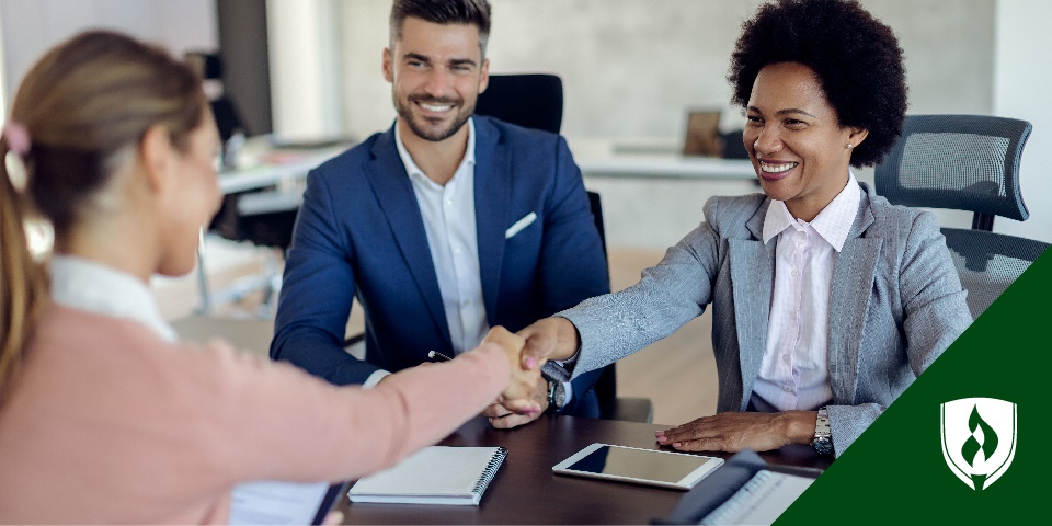 photo of a diverse group of human resource professionals shaking hands