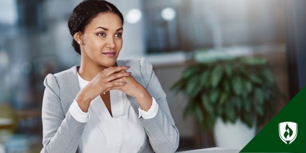 A CEO folds her hands and considers her decision
