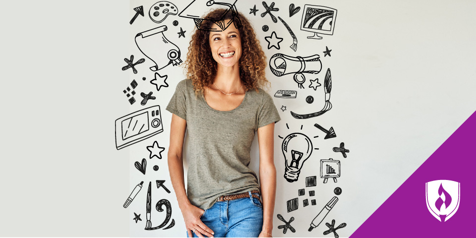 female with drawn graduation cap and other drawings on wall