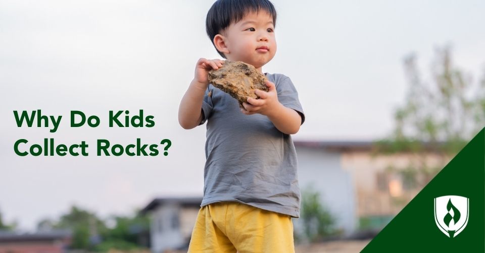 kids collect rocks header An adorable toddler holds a big rock with both hands