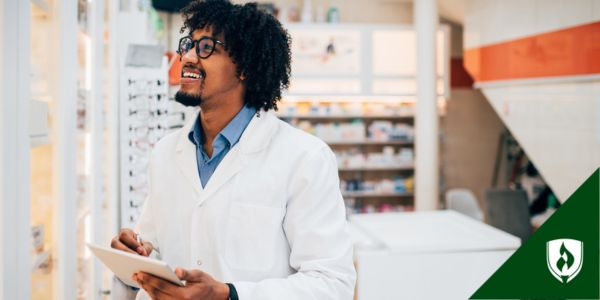 A pharmacy tech looks over the inventory