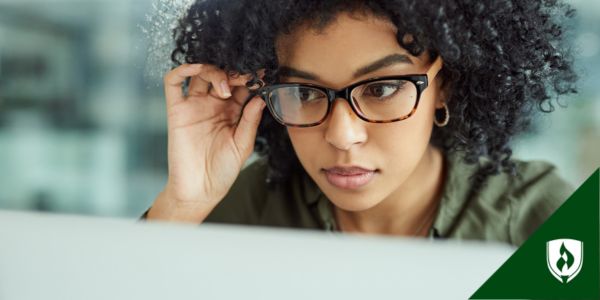A paralegal looks over important documents
