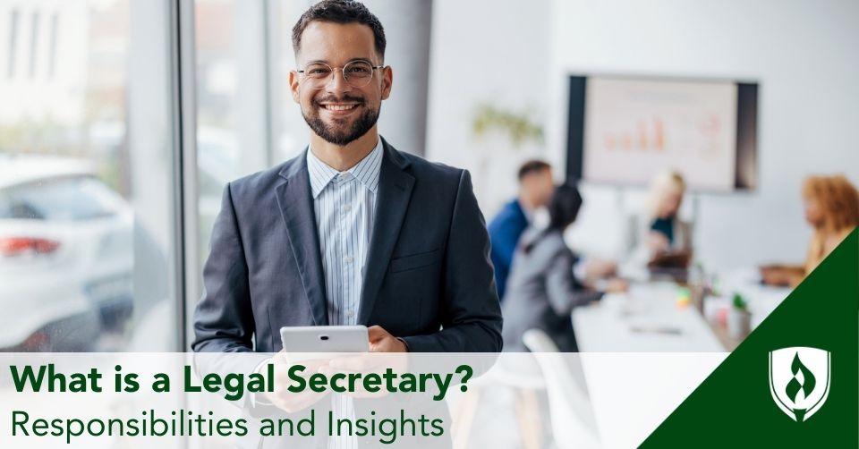 legal secretary header A legal secretary smiles, holding a tablet during a meeting