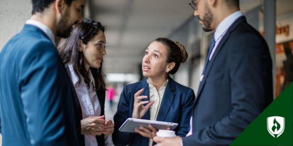 Attorneys and paralegals meet urgently in the hall