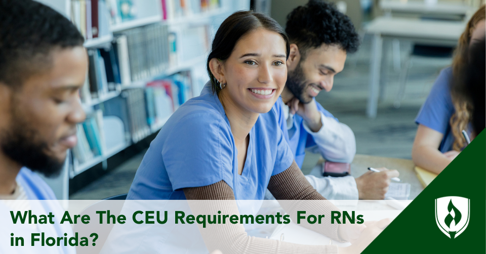 Nurses sit laughing and learning at a table