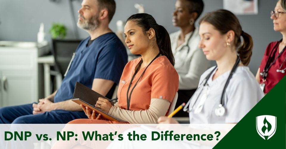 DNP vs NP header Three nurses sit in a conference.