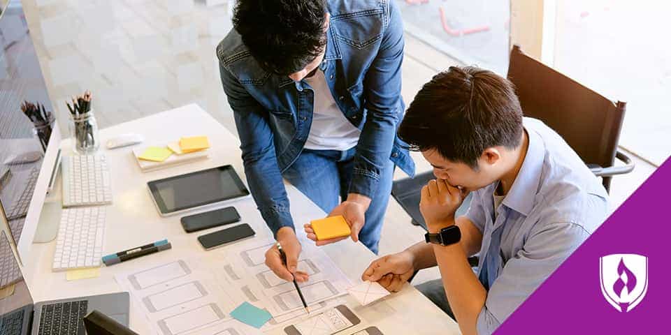 web designers working at desk