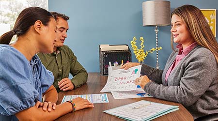 Teacher meeting with parents