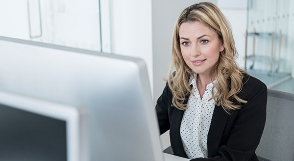 Female working on computer HIM